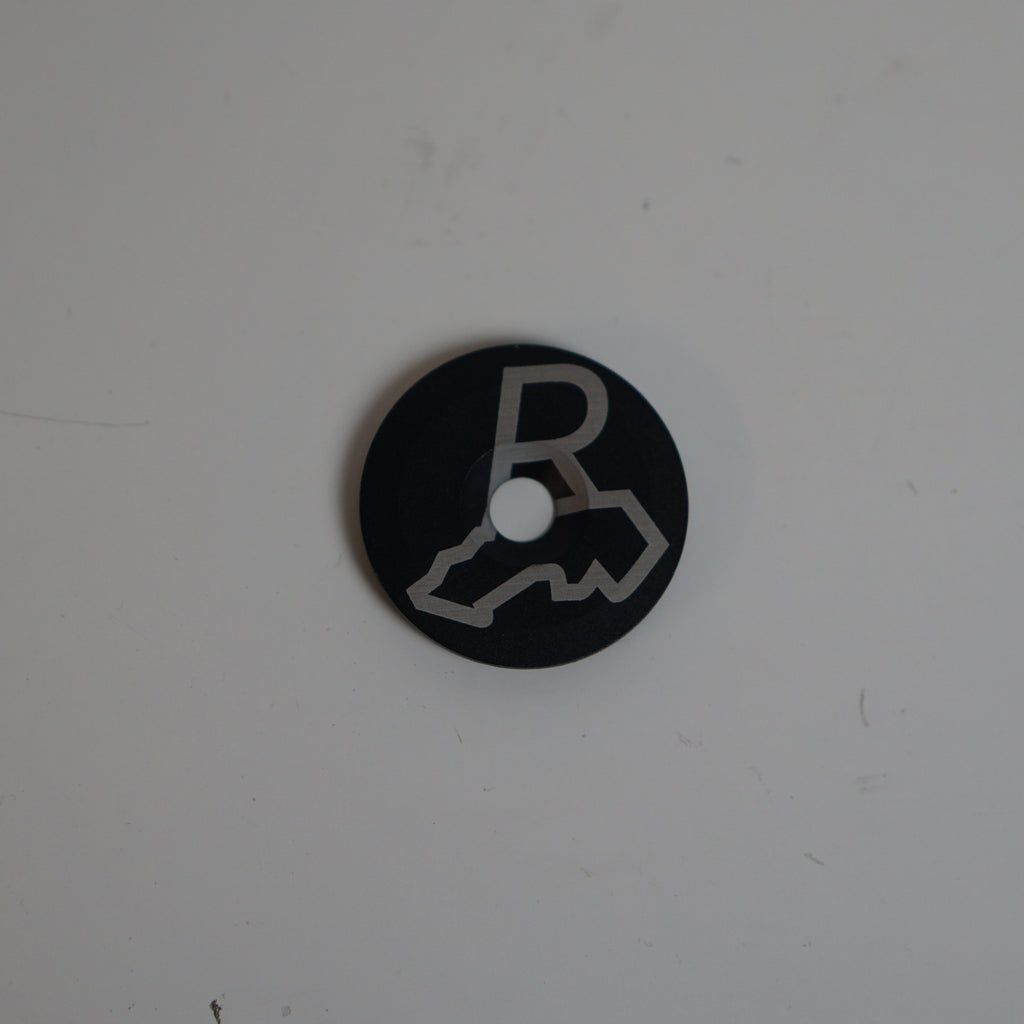 Randbezirk Top Cap - R Logo