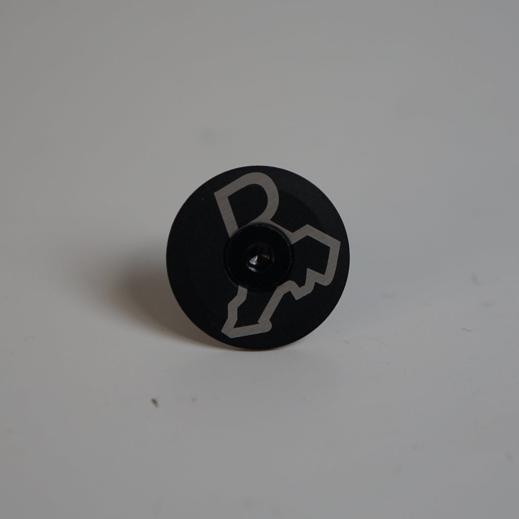 Randbezirk Top Cap - R Logo
